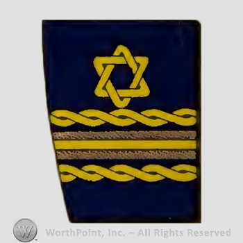 Mark with A cuff, a star, two curly stripes and a | #928487