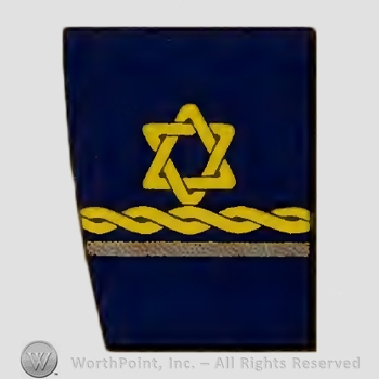 Mark with A cuff, a star, a curly stripe and a | #928489
